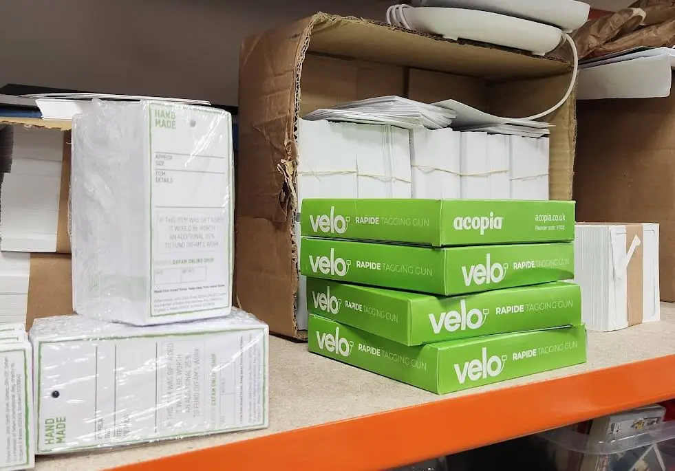 Velo sacks stacked on a stockroom shelf